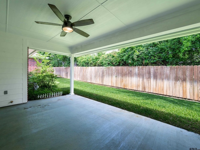 1521 Rice Rd Unit U102, Tyler, TX 75703 - fenced backyard with a ceiling fan and a patio