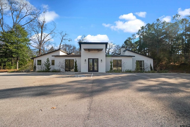 modern home featuring french doors