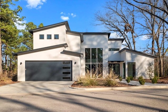 modern home featuring a garage