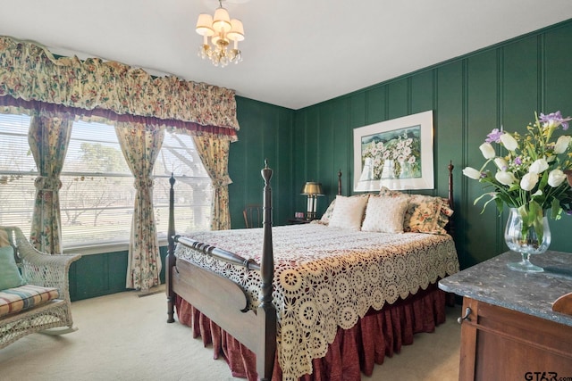 bedroom with light colored carpet and an inviting chandelier