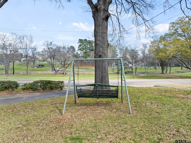 view of play area with a yard