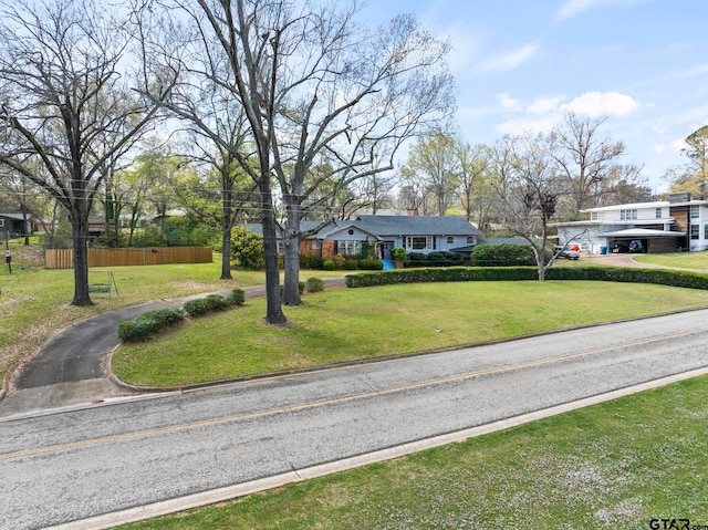 view of front facade with a front yard