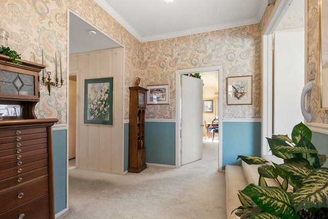 hallway with light carpet and crown molding