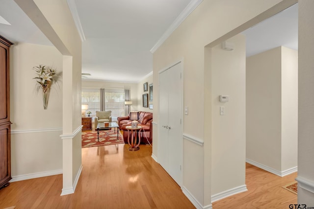 1521A101 Rice Rd, Tyler, TX 75703 - hallway with light wood-type flooring, crown molding, and baseboards