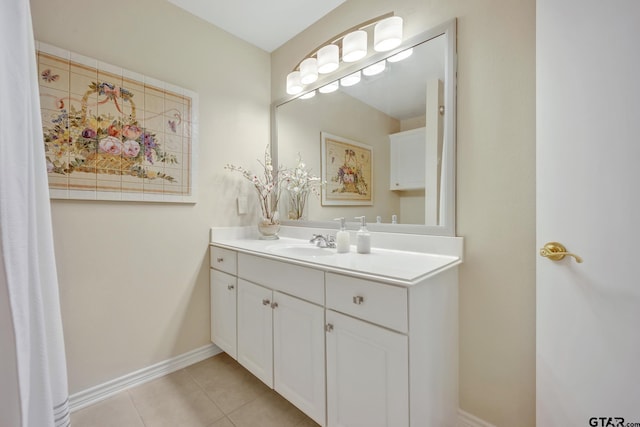 1521A101 Rice Rd, Tyler, TX 75703 - bathroom with vanity, tile patterned flooring, and baseboards
