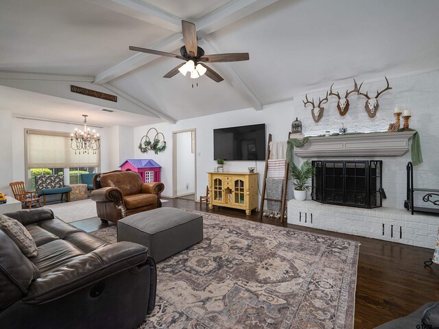 4922 Leaning Oaks Dr, Flint, TX 75762 - living room with a chandelier, wood finished floors, a fireplace, and a ceiling fan
