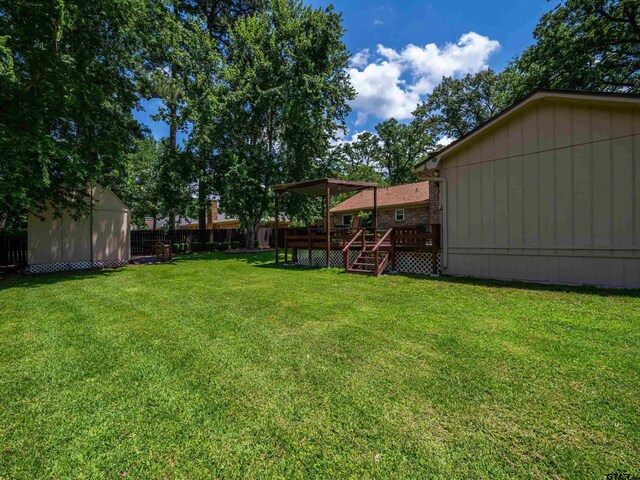 4922 Leaning Oaks Dr, Flint, TX 75762 - view of yard featuring a deck and stairs