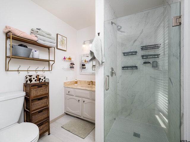 4922 Leaning Oaks Dr, Flint, TX 75762 - full bath featuring toilet, vanity, a stall shower, and tile patterned floors