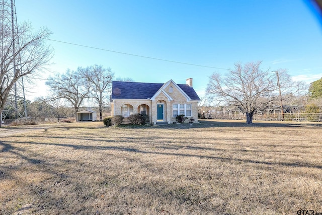 view of front of home with a front yard