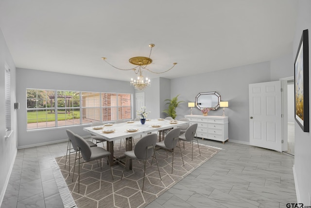 dining room featuring a chandelier