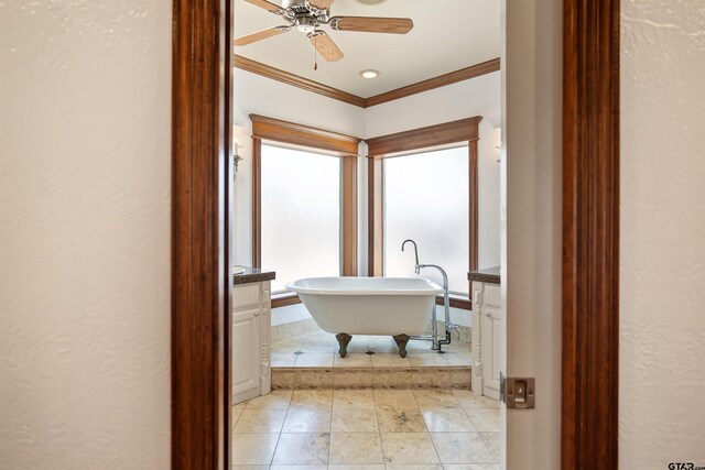 906 Millstone Ln, Chandler, TX 75758 - full bathroom featuring a freestanding bath, crown molding, a ceiling fan, and tile patterned floors