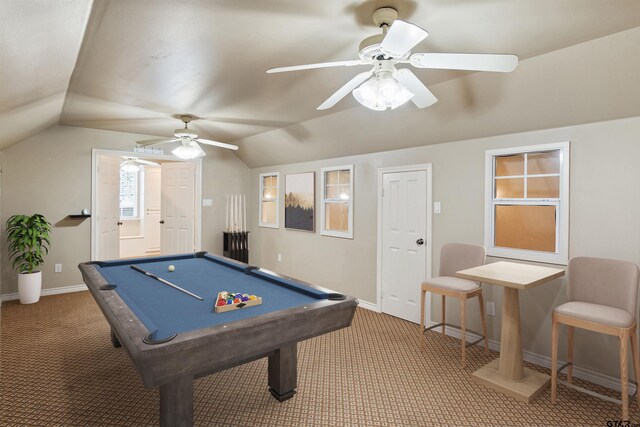 rec room with ceiling fan, lofted ceiling, baseboards, and light carpet