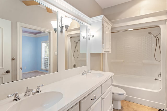 full bath with toilet, a sink, double vanity, and bathing tub / shower combination