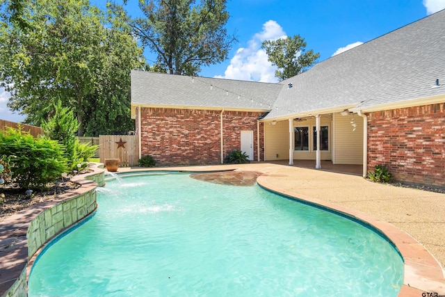 view of swimming pool with fence, a patio area, and a fenced in pool