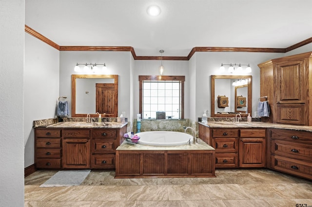 bathroom with a tub, vanity, and crown molding