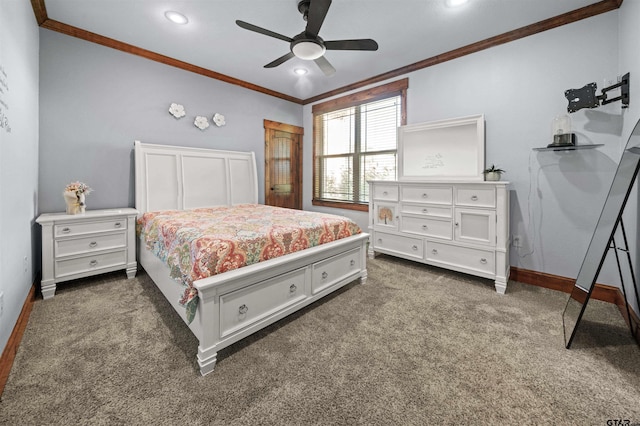 bedroom featuring ornamental molding, dark colored carpet, and ceiling fan