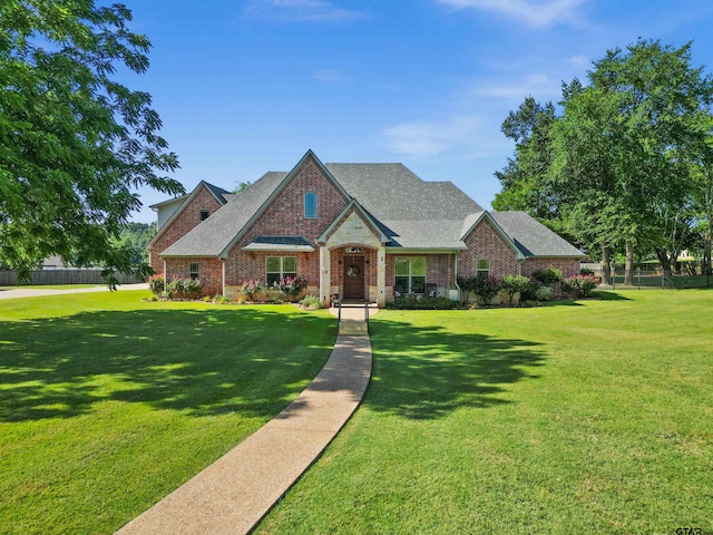 craftsman-style home with a front yard