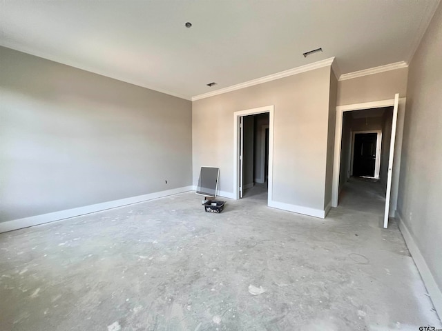 spare room with crown molding