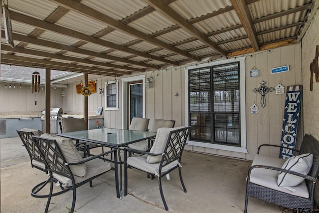 view of patio with a grill