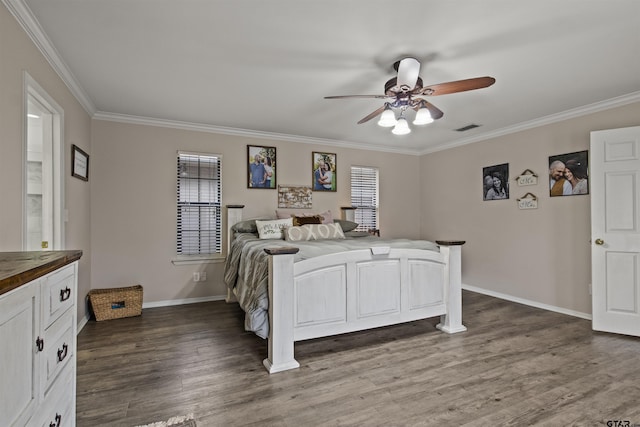 bedroom with ceiling fan, dark hardwood / wood-style flooring, and ornamental molding