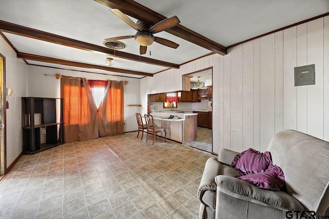 10926 W US Highway 84, Rusk, TX 75785 - living area featuring beam ceiling, ceiling fan, and wooden walls