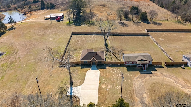 bird's eye view with a water view and a rural view