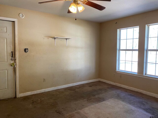 spare room featuring ceiling fan