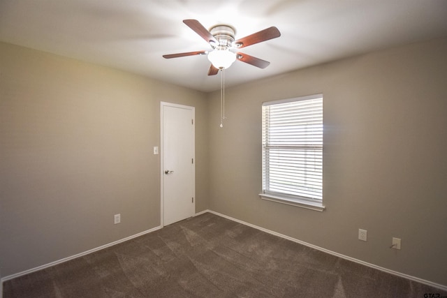 105 Ash Dr, Bullard, TX 75757 - empty room with ceiling fan, dark colored carpet, and baseboards