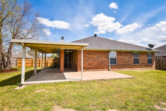 105 Ash Dr, Bullard, TX 75757 - back of property featuring a patio, brick siding, roof with shingles, and a chimney
