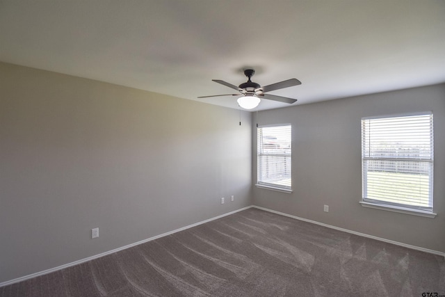 105 Ash Dr, Bullard, TX 75757 - empty room with ceiling fan, dark colored carpet, and baseboards