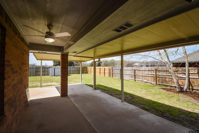 105 Ash Dr, Bullard, TX 75757 - view of patio / terrace with ceiling fan, a storage shed, and an outdoor structure