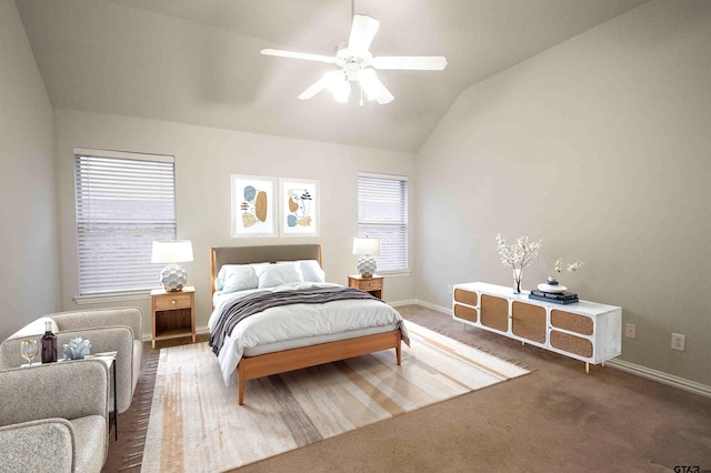 carpeted bedroom with lofted ceiling, a ceiling fan, and baseboards