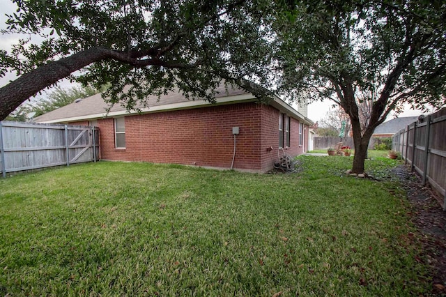 exterior space featuring a fenced backyard