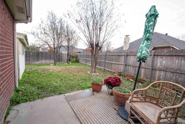 view of patio featuring a fenced backyard