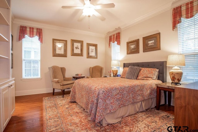 bedroom featuring hardwood / wood-style flooring, ceiling fan, and ornamental molding