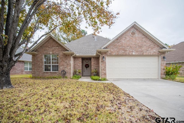 single story home with a garage