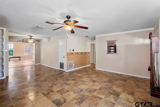 unfurnished living room with crown molding and ceiling fan