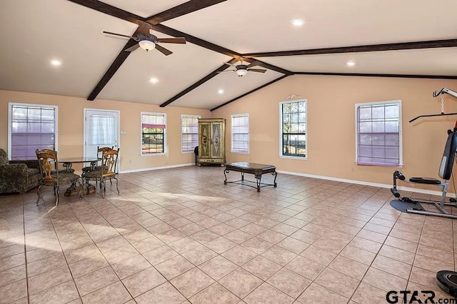 living room with lofted ceiling with beams, light tile patterned floors, and ceiling fan