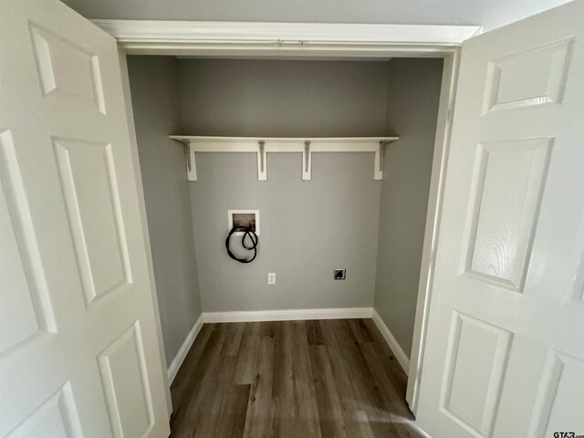 laundry room featuring washer hookup, dark hardwood / wood-style floors, and electric dryer hookup