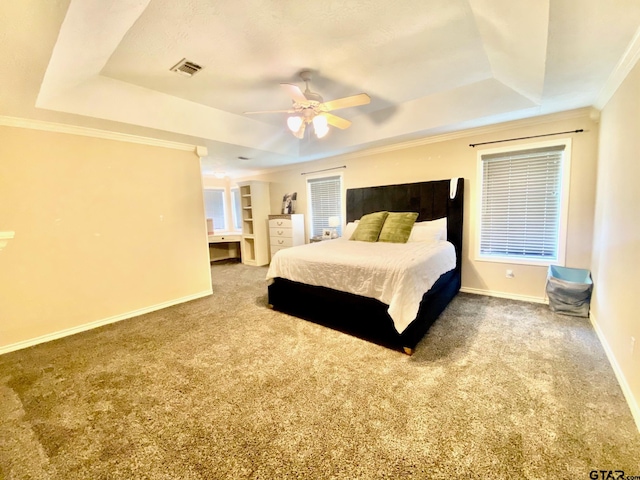 403 Aspen Bend St, Crockett, TX 75835 - bedroom with a tray ceiling, carpet, crown molding, and a ceiling fan