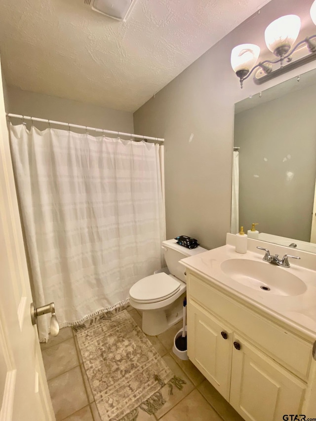 403 Aspen Bend St, Crockett, TX 75835 - full bath with tile patterned flooring, vanity, and a textured ceiling