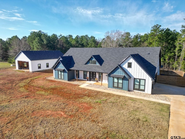 view of front facade with a garage and a front lawn