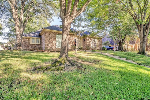 view of front of house with a front yard