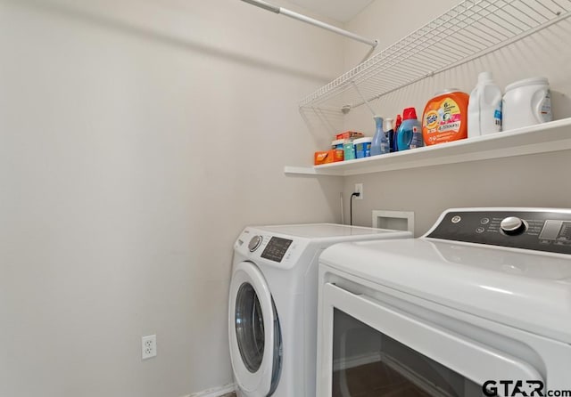 laundry room featuring independent washer and dryer