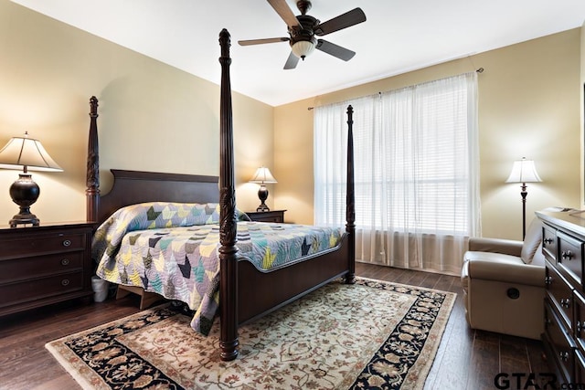 bedroom featuring dark wood-type flooring and ceiling fan