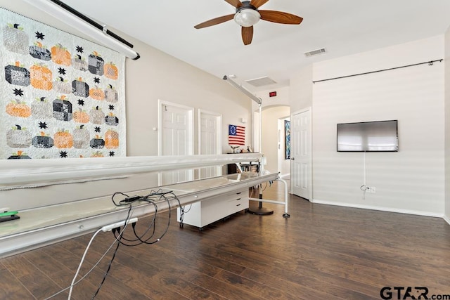 miscellaneous room with dark wood-type flooring and ceiling fan