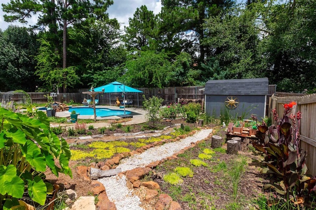 8416 Crooked Trl, Tyler, TX 75703 - fenced backyard with a storage shed and view of wooded area