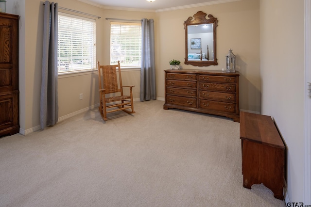 sitting room featuring light carpet and crown molding