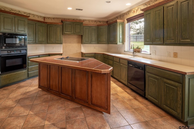 kitchen featuring black appliances, sink, a kitchen island, and light tile patterned floors