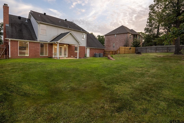 exterior space featuring a patio and a lawn